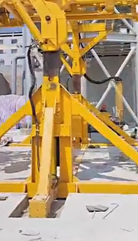 Elevatable container tilter